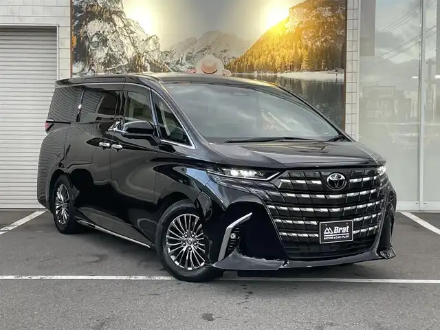 トヨタ アルファードハイブリット エグゼクティブ ラウンジ 長野県 2023(令5)年 1.4万km ブラック ワンオーナー/14インチ純正ディスプレイオーディオ（コネクティッドナビ対応）/ニュートラルベージュレザーシート/左右独立ムーンルーフ/JBLプレミアムサウンドシステム/14インチフリップダウンモニター（リヤエンターテインメントシステム）/メーカーオプションCD/DVDデッキ/メーカーオプション両側ユニバーサルステップ/エグゼクティブラウンジ用フロアマット/AC100V電源/おくだけ充電/トヨタセーフティセンス/ドアバイザー/バックカメラ・全方位カメラ/ETC2.0/前後ドライブレコーダー/両側パワースライドドア/プッシュスタート/追従機能付クルーズコントロール/オットマン