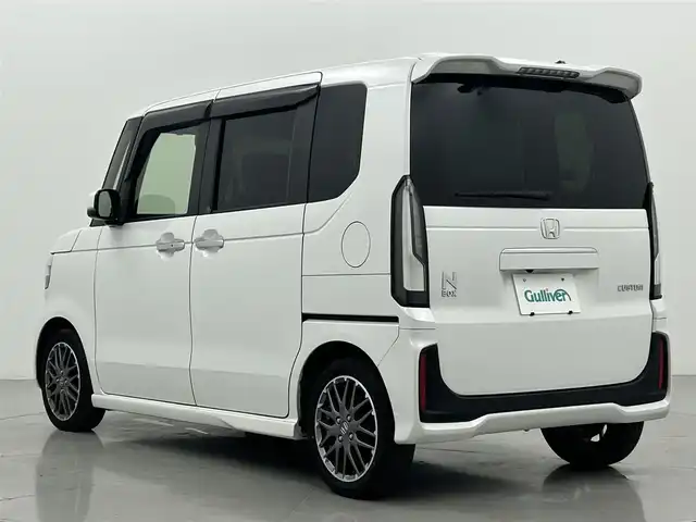 ホンダ Ｎ ＢＯＸ カスタム ターボ 熊本県 2024(令6)年 2.8万km プラチナホワイトパール 社外８インチナビMDV-S810L（ＣＤ・ＤＶＤ・フルセグ・ＢＴ・ＳＤ・ＵＳＢ）/バックカメラ　/ビルトインＥＴＣ　/両側パワースライドドア　/レーダークルーズコントロール　/車線逸脱警報/衝突軽減ブレーキ/路外逸脱制御機能/踏み間違い衝突軽減システム/パーキングセンサー警報/横滑り防止/アイドリングストップ/前後クリアランスソナー　/前席シートヒーター/ハーフレザーシート/パドルシフト/社外フロアマット/純正１５インチAW/オートライト/LEDヘッドライト/スマートキー/プッシュスタート