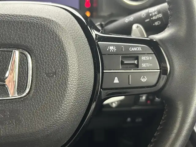 ホンダ Ｎ ＢＯＸ カスタム ターボ 熊本県 2024(令6)年 2.8万km プラチナホワイトパール 社外８インチナビMDV-S810L（ＣＤ・ＤＶＤ・フルセグ・ＢＴ・ＳＤ・ＵＳＢ）/バックカメラ　/ビルトインＥＴＣ　/両側パワースライドドア　/レーダークルーズコントロール　/車線逸脱警報/衝突軽減ブレーキ/路外逸脱制御機能/踏み間違い衝突軽減システム/パーキングセンサー警報/横滑り防止/アイドリングストップ/前後クリアランスソナー　/前席シートヒーター/ハーフレザーシート/パドルシフト/社外フロアマット/純正１５インチAW/オートライト/LEDヘッドライト/スマートキー/プッシュスタート