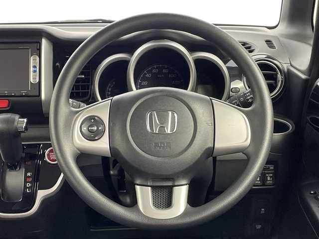 ホンダ Ｎ ＢＯＸ カスタム SSパッケージ 新潟県 2014(平26)年 8.3万km プレミアムゴールドパープルパール 純正メモリナビ【VXM-145VSi】/　Bluetooth/ワンセグTV/CD/DVD/USB/CTBA(シティブレーキアクティブシステム)/両側パワースライドドア/バックモニター/ETC/アイドリングストップ/横滑り防止装置/オートライト/レザー調シートカバー/ステアリングスイッチ/禁煙車