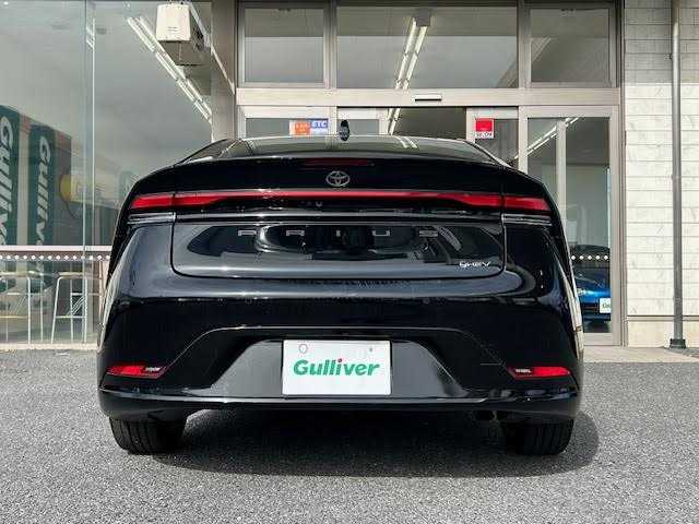 トヨタ プリウス Z 埼玉県 2023(令5)年 1.3万km アティチュードブラックマイカ 外部検査実施済み/ムーンルーフ/純正メモリナビ/ (フルセグTV/Bluetooth/USB/Miracast)/パノラミックビューモニター/ビルトインETC2.0/前後ドライブレコーダー/デジタルインナーミラー/レザーシート/D席パワーシート【メモリ機能あり】/前席シートヒーター/エアシート/パワーバックドア/ステアリングヒーター/TOYOTA Safety Sense/・レーダークルーズ コントロール/・プリクラッシュセーフティ/・レーントレーシングアシスト/・レーンディパーチャーアラート/・ロードサインアシスト/・先行車発進告知機能/・オートマチックハイビーム/ブラインドスポットモニター/プロアクティブドライビングアシスト/リアクロストラフィックアラート/リアカメラディクション/パーキングサポートブレーキ/安心降車アシスト/横滑り防止機能/スマートキー/純正19インチアルミホイール/置くだけ充電/100V電源/純正LEDヘッドライト/カーテンエアバック/スペアキー1本/保証書/取扱説明書