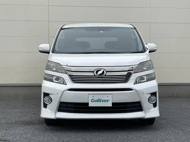 トヨタ ヴェルファイア 2．4Z Gエディション 茨城県 2012(平24)年 11.2万km ホワイトパールクリスタルシャイン 純正8インチナビ/フリップダウンモニター/革巻きステアリング/ステアリングスイッチ/クルーズコントロール/パワーシート/オットマン/両側パワースライドドア/パワーバックドア/バックカメラ/フォグランプ/スマートキー