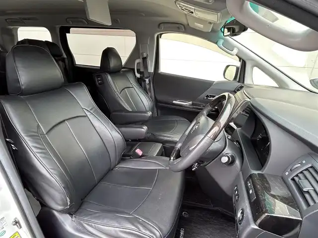トヨタ ヴェルファイア 2．4Z Gエディション 茨城県 2012(平24)年 11.2万km ホワイトパールクリスタルシャイン 純正8インチナビ/フリップダウンモニター/革巻きステアリング/ステアリングスイッチ/クルーズコントロール/パワーシート/オットマン/両側パワースライドドア/パワーバックドア/バックカメラ/フォグランプ/スマートキー