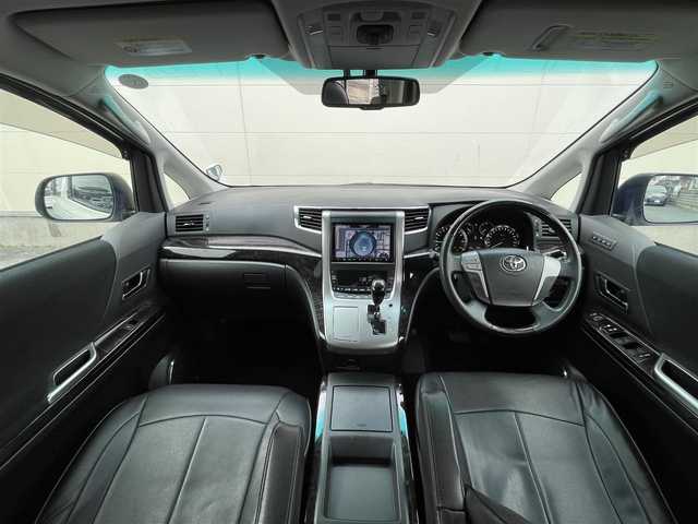 トヨタ ヴェルファイア 2．4Z Gエディション 道央・札幌 2012(平24)年 11.2万km ホワイトパールクリスタルシャイン 純正8インチナビ/フリップダウンモニター/革巻きステアリング/ステアリングスイッチ/クルーズコントロール/パワーシート/オットマン/両側パワースライドドア/パワーバックドア/バックカメラ/フォグランプ/スマートキー