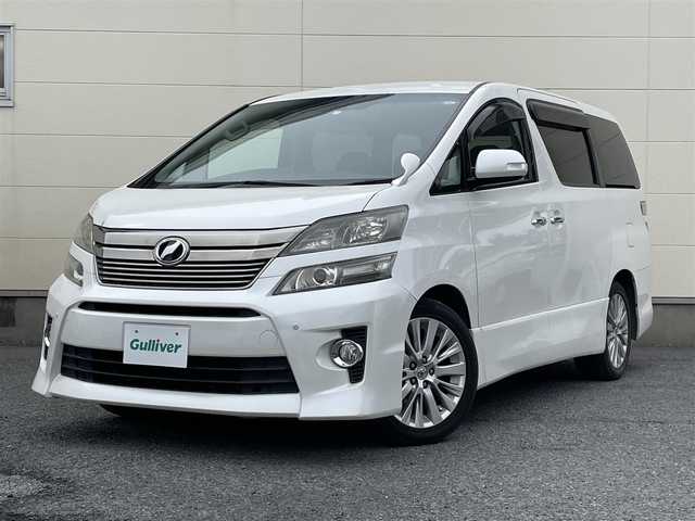 トヨタ ヴェルファイア 2．4Z Gエディション 道央・札幌 2012(平24)年 11.2万km ホワイトパールクリスタルシャイン 純正8インチナビ/フリップダウンモニター/革巻きステアリング/ステアリングスイッチ/クルーズコントロール/パワーシート/オットマン/両側パワースライドドア/パワーバックドア/バックカメラ/フォグランプ/スマートキー