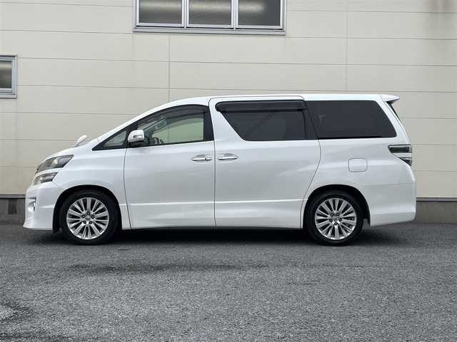 トヨタ ヴェルファイア 2．4Z Gエディション 道央・札幌 2012(平24)年 11.2万km ホワイトパールクリスタルシャイン 純正8インチナビ/フリップダウンモニター/革巻きステアリング/ステアリングスイッチ/クルーズコントロール/パワーシート/オットマン/両側パワースライドドア/パワーバックドア/バックカメラ/フォグランプ/スマートキー