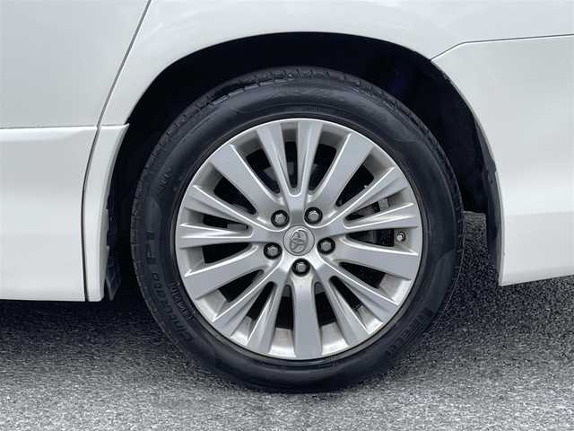 トヨタ ヴェルファイア 2．4Z Gエディション 道央・札幌 2012(平24)年 11.2万km ホワイトパールクリスタルシャイン 純正8インチナビ/フリップダウンモニター/革巻きステアリング/ステアリングスイッチ/クルーズコントロール/パワーシート/オットマン/両側パワースライドドア/パワーバックドア/バックカメラ/フォグランプ/スマートキー