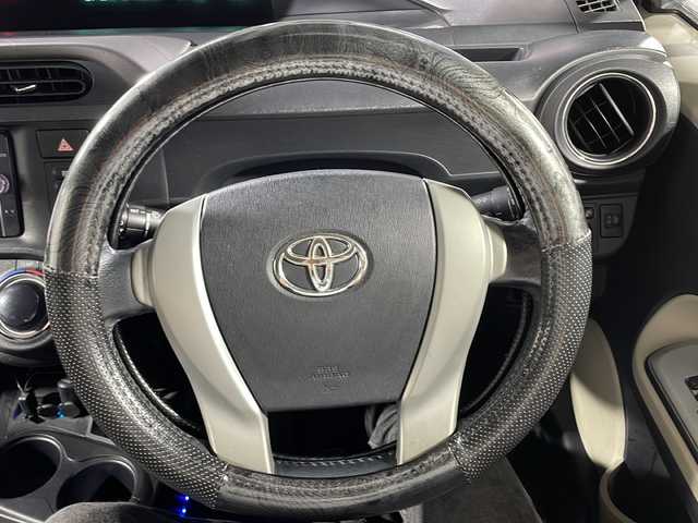 トヨタ アクア G 沖縄県 2012(平24)年 11.7万km シルバーマイカM 禁煙車　/ナビ（ＣＤ／ＴＶ／Ｂｌｕｅｔｏｏｔｈ／ＡＭ／ＦＭ）　/前後方向ドライブレコーダー　/バックカメラ　/ＥＴＣ　/ＵＳＢ充電　/ドアバイザー　/電動格納ミラー　/プッシュスタート　/エアバック　/純正１５インチＡＷ