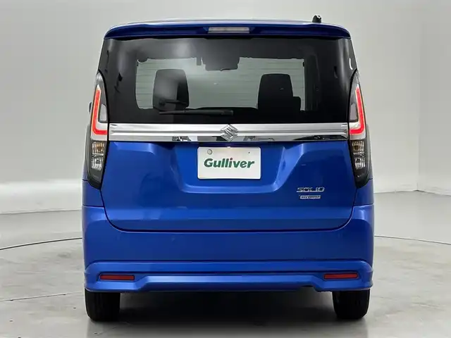 スズキ ソリオ HV MZ 福岡県 2023(令5)年 1.2万km スピーディーブルーM ワンオーナー　/後席モニター　/純正８型ナビ／フルセグＴＶ　/バックカメラ　/前後ドライブレコーダー　/レーダークルーズコントロール　/コーナーセンサー　/衝突被害軽減ブレーキ　/レーンキープ　/横滑り防止装置　/アイドリングストップ　/両側電動スライドドア　/シートヒーター　/ヘッドアップディスプレイ　/LEDヘッドライト　/純正１５インチアルミホイール