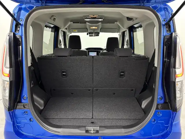 スズキ ソリオ HV MZ 福岡県 2023(令5)年 1.2万km スピーディーブルーM ワンオーナー　/後席モニター　/純正８型ナビ／フルセグＴＶ　/バックカメラ　/前後ドライブレコーダー　/レーダークルーズコントロール　/コーナーセンサー　/衝突被害軽減ブレーキ　/レーンキープ　/横滑り防止装置　/アイドリングストップ　/両側電動スライドドア　/シートヒーター　/ヘッドアップディスプレイ　/LEDヘッドライト　/純正１５インチアルミホイール