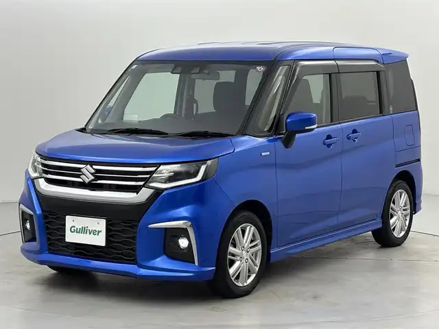 スズキ ソリオ HV MZ 福岡県 2023(令5)年 1.2万km スピーディーブルーM ワンオーナー　/後席モニター　/純正８型ナビ／フルセグＴＶ　/バックカメラ　/前後ドライブレコーダー　/レーダークルーズコントロール　/コーナーセンサー　/衝突被害軽減ブレーキ　/レーンキープ　/横滑り防止装置　/アイドリングストップ　/両側電動スライドドア　/シートヒーター　/ヘッドアップディスプレイ　/LEDヘッドライト　/純正１５インチアルミホイール