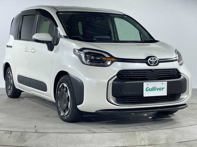 トヨタ シエンタ ハイブリッド Z 福岡県 2023(令5)年 1.6万km ホワイトパールクリスタルシャイン 禁煙車純正ディスプレイオーディオAM FM BTフルセグテレビパノラマビューモニタートヨタセーフティセンス両側パワースライドドアシートヒーター（D/N)革巻きステアリングステアリングスイッチステアリングヒーターLEDヘッドライトオートライトETC2.0スマートキープッシュスタートエンジン