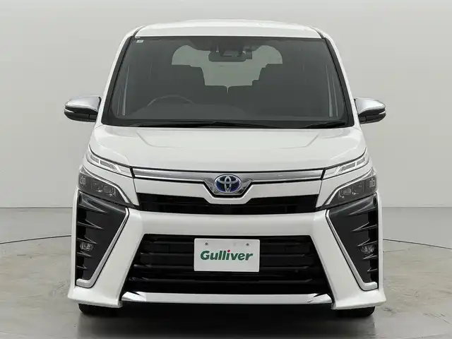 トヨタ ヴォクシー ハイブリッド ZS 煌Ⅲ 福岡県 2021(令3)年 5.2万km ホワイトパールクリスタルシャイン 後席モニター　/社外ナビ　/衝突軽減　/ＰＫＳＢ　/レーンキープ　/コーナーセンサー　/クルコン　/両側パワースライドドア　/シートヒーター　/ＥＴＣ　/ドラレコ　/ドライブモード　/ＷＡＣ　/オートライト　/純正アルミホイール