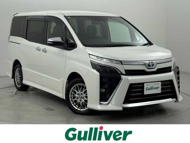 トヨタ ヴォクシー ハイブリッド ZS 煌Ⅲ 福岡県 2021(令3)年 5.2万km ホワイトパールクリスタルシャイン 後席モニター　/社外ナビ　/衝突軽減　/ＰＫＳＢ　/レーンキープ　/コーナーセンサー　/クルコン　/両側パワースライドドア　/シートヒーター　/ＥＴＣ　/ドラレコ　/ドライブモード　/ＷＡＣ　/オートライト　/純正アルミホイール
