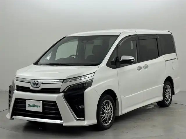 トヨタ ヴォクシー ハイブリッド ZS 煌Ⅲ 福岡県 2021(令3)年 5.2万km ホワイトパールクリスタルシャイン 後席モニター　/社外ナビ　/衝突軽減　/ＰＫＳＢ　/レーンキープ　/コーナーセンサー　/クルコン　/両側パワースライドドア　/シートヒーター　/ＥＴＣ　/ドラレコ　/ドライブモード　/ＷＡＣ　/オートライト　/純正アルミホイール