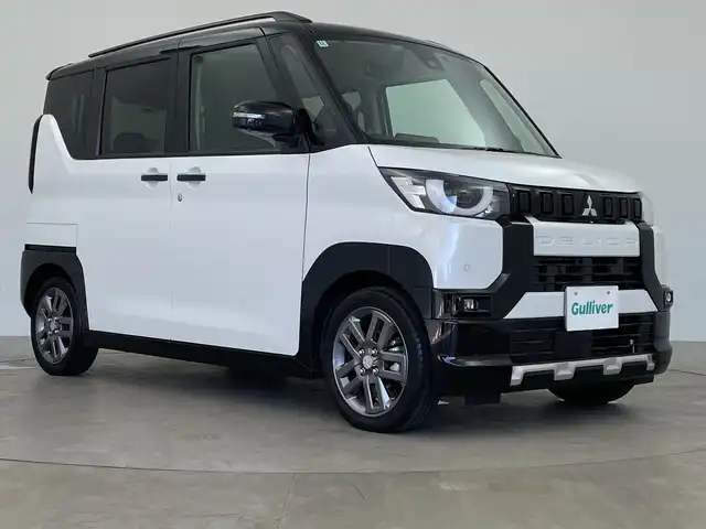 三菱 デリカミニ T プレミアム 鹿児島県 2024(令6)年 0.2万km アメジストブラック/シルキーホワイト 社外9インチナビ/(AM/FM/CD/DVD/Bluetooth/フルセグ/HDMI)/マルチアラウンドビューモニター/両側パワースライドドア/MI-PILOT/パドルシフト/ステアリングヒーター/ハーフレザーシート/前後ドライブレコーダー/デジタルインナーミラー/前席シートヒーター/純正15インチアルミホイール/後席サーキュレーター/アイドリングストップ/本革ステアリング/e-Assist/LEDヘッドライト/ルーフレール/スマートキー
