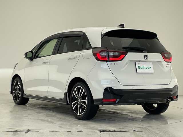ホンダ フィット e:HEV RS 沖縄県 2024(令6)年 3.5万km プラチナホワイトパール 純正ナビ【VXU-245FTI】/（フルセグTV/CD/DVD/Bluetooth）/衝突被害軽減装置/横滑り防止装置/盗難防止装置/カーテンエアバック/バックカメラ/ETC/レーダークルコン/プッシュスタート/スマートキー/ハーフレザーシート/純正フロアマット/純正エアロパーツ（フロント/サイド/リア）/オートヘッドライト/LEDヘッドライト/前後コーナーセンサー