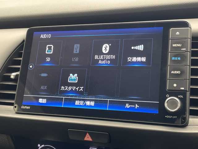 ホンダ フィット e:HEV RS 沖縄県 2024(令6)年 3.5万km プラチナホワイトパール 純正ナビ【VXU-245FTI】/（フルセグTV/CD/DVD/Bluetooth）/衝突被害軽減装置/横滑り防止装置/盗難防止装置/カーテンエアバック/バックカメラ/ETC/レーダークルコン/プッシュスタート/スマートキー/ハーフレザーシート/純正フロアマット/純正エアロパーツ（フロント/サイド/リア）/オートヘッドライト/LEDヘッドライト/前後コーナーセンサー