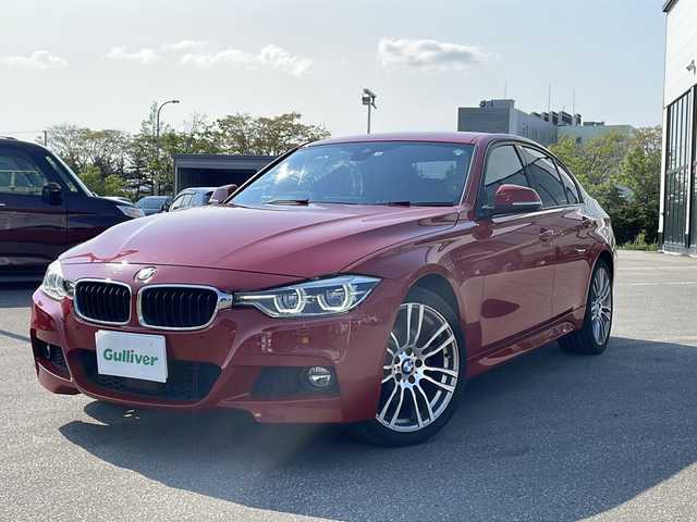 ＢＭＷ ３２０ｉ xDrive Mスポーツ 青森県 2018(平30)年 8.8万km 赤 ・４WD/・純正ナビ/・AM/FM Bluetooth / CD/DVD/・ステアリングリモコン/・クルーズコントロール/・衝突軽減装置/・コーナーセンサー前後/・横滑り抑制装置/・前席シートヒーター/・パワーシート/・パドルシフト/・オートライト/・プッシュスタート/・アイドリングストップ/・レーンキープアシスト/・ドライブレコーダー前方/・スタッドレスタイヤ積み込み/・保証書/・取扱説明書