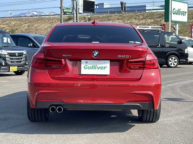 ＢＭＷ ３２０ｉ xDrive Mスポーツ 青森県 2018(平30)年 8.8万km 赤 ・４WD/・純正ナビ/・AM/FM Bluetooth / CD/DVD/・ステアリングリモコン/・クルーズコントロール/・衝突軽減装置/・コーナーセンサー前後/・横滑り抑制装置/・前席シートヒーター/・パワーシート/・パドルシフト/・オートライト/・プッシュスタート/・アイドリングストップ/・レーンキープアシスト/・ドライブレコーダー前方/・スタッドレスタイヤ積み込み/・保証書/・取扱説明書
