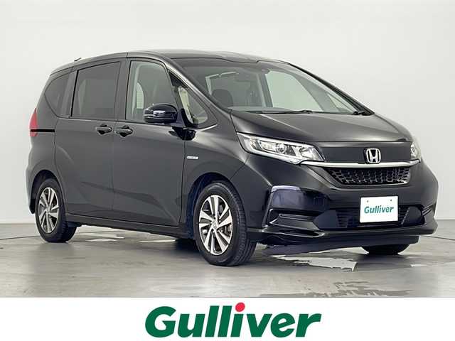ホンダ フリード＋ ハイブリット G ホンダセンシング 岐阜県 2020(令2)年 13.9万km クリスタルブラックパール ホンダセンシング/・衝突被害軽減ブレーキ/・誤発進抑制機能/・歩行者事故低減ステアリング/・路外逸脱抑制機能/・標識認識機能/・アダプティブクルーズコントロール/9インチフローティングナビ/Bluetooth/フルセグ/CD/DVD/BD/USB/バックカメラ/コーナーセンサー/両側パワースライドドア/ハーフレザーシート/シートヒーター（運転席/助手席）/スマートキー/プッシュスタート/スペアキー/革ステアリング/ステアリングスイッチ/ETC/純正アルミホイール/純正フロアマット/LEDヘッドライト/オートライト/電動格納ミラー