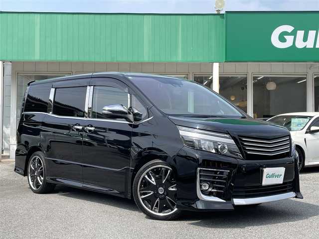 トヨタ ヴォクシー ZS 煌Ⅱ 千葉県 2017(平29)年 7.1万km ブラック ワンオーナー/トヨタセーフティーセンス/・プリクラッシュセーフティー/・レーンキープアシスト/・オートマチックハイビーム/純正9インチSDナビ【NSZT-Y66T】/・CD/DVD/MSV/Bluetooth/フルセグ/純正フリップダウンモニター【V12T-R66C】/バックカメラ/両後パワースライドドア/社外グリル/社外19インチアルミホイール/ローダウン/スマートキー/社外前後ドライブレコーダー/ビルトインETC/純正LEDヘッドライト/フォグランプ/ドアバイザー/新車時保証書＆取扱説明書