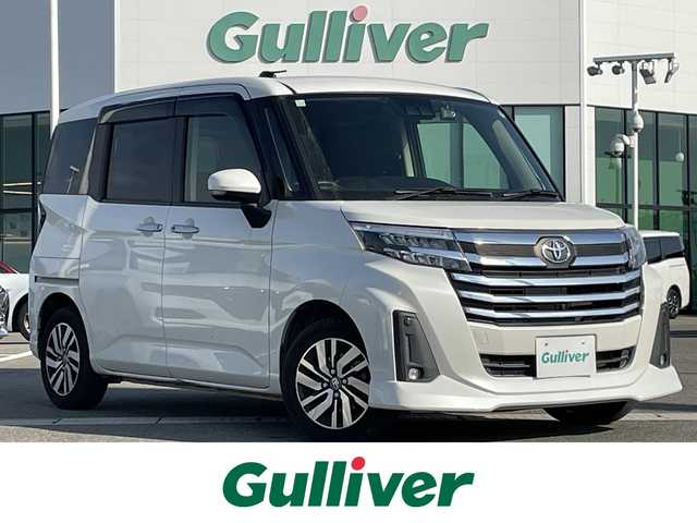 トヨタ ルーミー カスタムG 佐賀県 2021(令3)年 4万km パールホワイトⅢ 純正9インチディスプレイオーディオ/・フルセグTVAM/FM/Bluetooth/・Apple Car Play/Android Auto/パノラミックビューモニター/前後ドライブレコーダー/ビルトインETC/TVキャンセラー/両側パワースライドドア/電子パーキングブレーキ/・AUTO HOLD機能/後席サンシェード/ISOFIX対応/革巻きステアリング/ステアリングリモコン/純正14インチアルミホイール/純正LEDヘッドライト/・オートマチックハイビーム/純正LEDフォグランプ/純正フロアマット/純正ドアバイザ―/新車保証書/取扱説明書/スペアキー１本/スマートアシスト/・レーダークルーズコントロール/・先行車発進お知らせ機能/・衝突被害軽減ブレーキ/・車線逸脱警報機能/・標識認識機能/・ふらつき警報