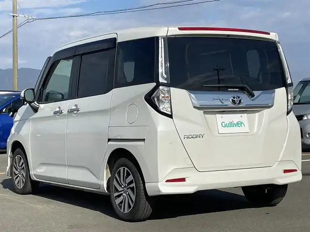 トヨタ ルーミー カスタムG 佐賀県 2021(令3)年 4万km パールホワイトⅢ 純正9インチディスプレイオーディオ/・フルセグTVAM/FM/Bluetooth/・Apple Car Play/Android Auto/パノラミックビューモニター/前後ドライブレコーダー/ビルトインETC/TVキャンセラー/両側パワースライドドア/電子パーキングブレーキ/・AUTO HOLD機能/後席サンシェード/ISOFIX対応/革巻きステアリング/ステアリングリモコン/純正14インチアルミホイール/純正LEDヘッドライト/・オートマチックハイビーム/純正LEDフォグランプ/純正フロアマット/純正ドアバイザ―/新車保証書/取扱説明書/スペアキー１本/スマートアシスト/・レーダークルーズコントロール/・先行車発進お知らせ機能/・衝突被害軽減ブレーキ/・車線逸脱警報機能/・標識認識機能/・ふらつき警報