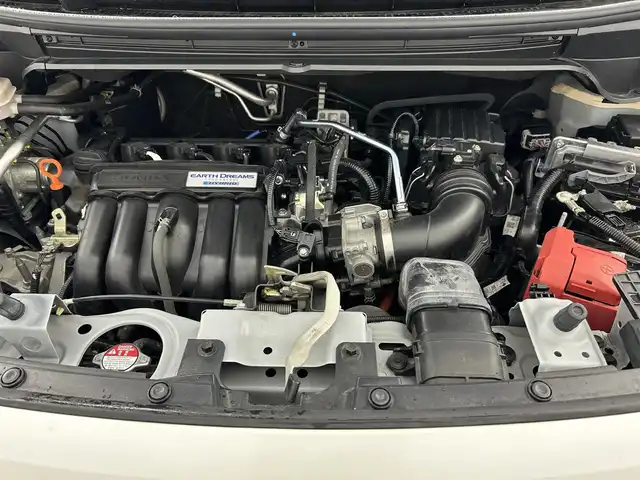 ホンダ フリード ハイブリット G ホンダセンシング 千葉県 2020(令2)年 6.2万km プラチナホワイトパール フリップダウンモニター/ホンダセンシング/・衝突軽減ブレーキ/・先行車発進お知らせ機能/・路外逸脱抑制機能/・レーンキープアシスト/社外9インチフローティングナビ/CD DVD BT フルセグ/バックカメラ/両側パワースライドドア/レーダークルーズコントロール/LEDオートライト/シートヒーター/純正15インチアルミホイール/ステアリングスイッチ/純正フロアマット/プッシュスタート/スマートキー/ETC