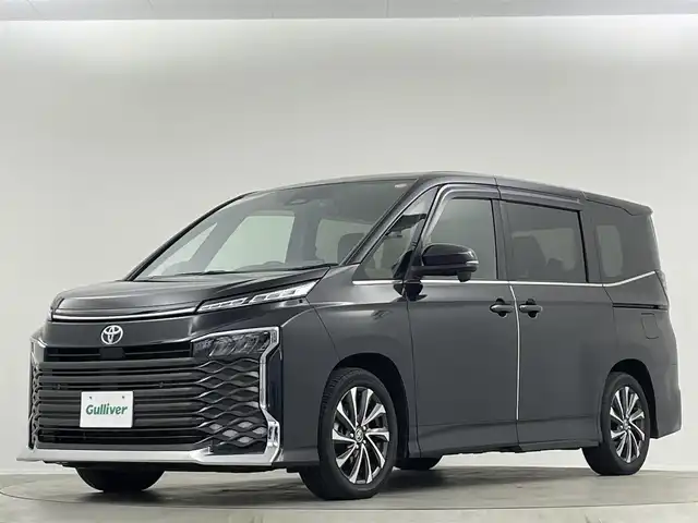 トヨタ ヴォクシー S－Z 埼玉県 2022(令4)年 1.8万km グリッターブラックガラスフレーク 純正ナビ　後席モニター　両側電動スライドドア　シートヒーター　バックカメラ　前後ドライブレコーダー　ETC2.0　追従走行　ＭＴモード付ＡＴ　Bluetooth　電動リアゲート　オートハイビーム　レーンアシスト　ウォークスルー　純正フロアマット