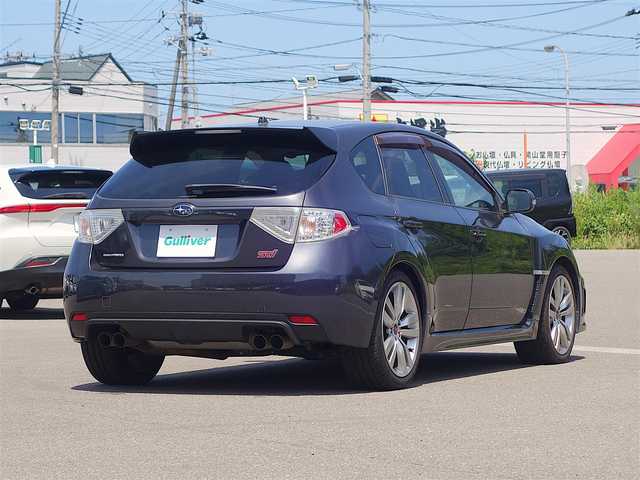スバル インプレッサ ＷＲＸ STi 山形県 2014(平26)年 13.8万km ダークグレーメタリック ４WD/純正カーオーディオ/　　【CD AUX RADIO】/HIDヘッドライト/ハーフレザーシート/パワーシート/STI18インチアルミホイール/ターボ/電動格納ウィンカーミラー/フォグランプ/AAC/純正フロアマット/ドアバイザー/スマートキー/ETC