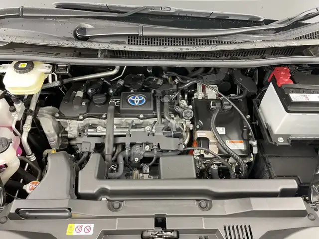 トヨタ ヴォクシー ハイブリッド S－Z 愛知県 2022(令4)年 3.9万km アティチュードブラックマイカ 禁煙車/ワンオーナー/純正10.5インチナビ/（CD/DVD/Bluetooth/フルセグTV/USB/HDMI)/バックカメラ/AC100V電源/トヨタセーフティセンス/・プリクラッシュセーフティ/・レーンディパーチャーアラート/・レーントレーシングアシスト/・オートマチックハイビーム/・レーダークルーズコントロール/・クリアランスソナー/・誤発進抑制機能/・パーキングサポートブレーキ/・ロードサインアシスト/ETC2.0/ドライブレコーダー/デジタルインナーミラー/快適利便パッケージ/・ステアリングヒーター/・ナノイーＸ/・ハンズフリーデュアルパワースライドドア/・オットマン/・１・2列目シートヒーター/・パワーバックドア/ステアリングヒーター/純正17インチアルミホイール/スマートキー/スペアキー有/プッシュスタート/電子パーキングブレーキ/オートホールド/LEDヘッドライト/フロントフォグランプ/フロアマット/革巻きステアリング/横滑り防止装置/純正ドアバイザー