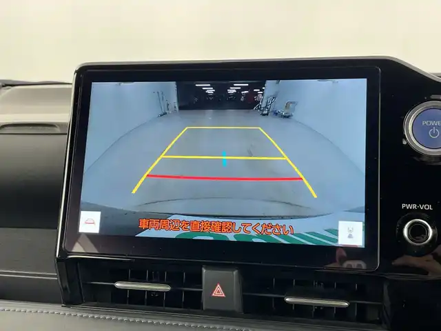トヨタ ヴォクシー ハイブリッド S－Z 愛知県 2022(令4)年 3.9万km アティチュードブラックマイカ 禁煙車/ワンオーナー/純正10.5インチナビ/（CD/DVD/Bluetooth/フルセグTV/USB/HDMI)/バックカメラ/AC100V電源/トヨタセーフティセンス/・プリクラッシュセーフティ/・レーンディパーチャーアラート/・レーントレーシングアシスト/・オートマチックハイビーム/・レーダークルーズコントロール/・クリアランスソナー/・誤発進抑制機能/・パーキングサポートブレーキ/・ロードサインアシスト/ETC2.0/ドライブレコーダー/デジタルインナーミラー/快適利便パッケージ/・ステアリングヒーター/・ナノイーＸ/・ハンズフリーデュアルパワースライドドア/・オットマン/・１・2列目シートヒーター/・パワーバックドア/ステアリングヒーター/純正17インチアルミホイール/スマートキー/スペアキー有/プッシュスタート/電子パーキングブレーキ/オートホールド/LEDヘッドライト/フロントフォグランプ/フロアマット/革巻きステアリング/横滑り防止装置/純正ドアバイザー