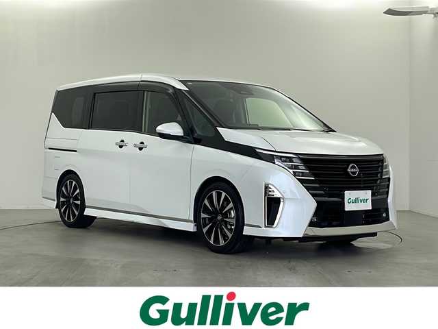 日産 セレナ e－パワー ハイウェイスター V 栃木県 2024(令6)年 1.4万km プリズムホワイト 純正メーカ12.3インチディスプレイナビ/(BT/AM/FM/CD/DVD/フルセグ/Apple Car Play／Android Aut）/ETC2.0/前後ドライブレコーダー/プロパイロット/プリクラッシュブレーキ/ブラインドスポットモニター/インテリジェントアラウンドビューカメラ/インテリジェントルームミラー/純正フリップダウンモニター/両側パワースライドドア/前席2列目シートヒーター/ステアリングヒーター/360°セーフティアシスト/衝突回避ステアリングアシスト/車線逸脱防止支援システム/後側方衝突防止支援システム/後側方車両検知警報/踏み間違い衝突防止アシスト/標識認識機能/スマートキー/プッシュスタート