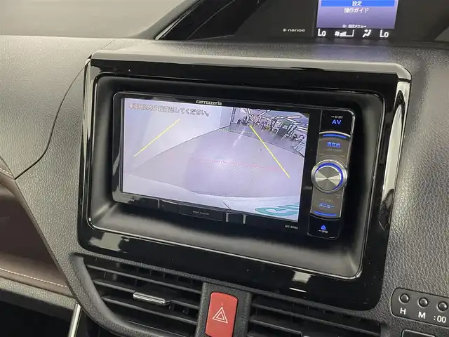 トヨタ エスクァイア Gi 道央・札幌 2015(平27)年 10万km ホワイトパールクリスタルシャイン ・４WD/・社外メモリナビ/　BT／CD／DVD／USB／SD／フルセグ/・バックカメラ/・純正ETC/・社外前後ドライブレコーダー/・社外フリップダウン/・横滑り防止/・両側パワースライドドア/・前席シートヒーター/・純正フロアマット/・社外スタッドレス15インチAW/・プッシュスタート/・スマートキー/・社外エンジンスターター（電池カバー欠品）/・LEDヘッドライト/・オートライト/・オートマチックハイビーム/・フロントフォグ/・ドアミラーウィンカー/・ドアバイザー/・オートリトラクダブルミラー/・ステアリングスイッチ/・nanoe/・ECOMODE/・保証書/・取扱説明書