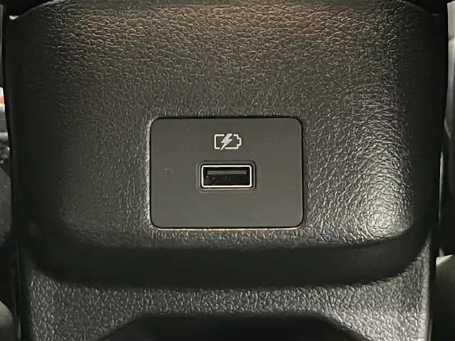 日産 オーラ G 鹿児島県 2023(令5)年 2.3万km 黒 禁煙車/ナビ(AVN-LBS01)/　・Bluetooth/　・AUX/デジタルインナーミラー/アラウンドビューカメラ/インテリジェントエマージェンシーブレーキ/踏み間違い衝突防止アシスト/標識検知機能/車線逸脱警報/ふらつき警報/BSW/LEDヘッドライト/アダプティブLEDヘッドライトシステム/電動パーキングブレーキ/オートブレーキホールド/ETC/ドライブレコーダー/ハーフレザーシート/ステアリングリモコン/電動格納ミラー