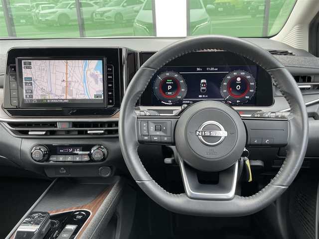 日産 オーラ G レザーエディション 香川県 2022(令4)年 2.6万km ピュアホワイトパール 登録時走行距離：26068km/純正9型ナビ/　CD DVD BT フルセグTV/全方位カメラ/エマージェンシーブレーキ/レーンキープアシスト/ブラインドスポットモニター/クリアランスソナー/ビルトインETC/前後ドライブレコーダー/デジタルインナーミラー/電子パーキングブレーキ/レザーシート/革巻きステアリング/ステアリングスイッチ/プッシュスタート/スマートキー/スペアキー
