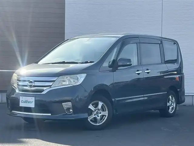 日産 セレナ ハイウェイスター 道東・釧路十勝 2010(平22)年 10.7万km スチールブルー 純正ナビ/４WD/両側パワスラ/フルセグ/バックカメラ/社外アルミ/スマートキー/アイドリングストップ/クルーズコントロール/プッシュスタート/フリップダウンモニター/社外フロアマット/純正ドアバイザー/ETC/ステアリングスイッチ/オートライト/ダブルオートエアコン/パワーステアリング/パワーウィンドウ/横滑り防止/電動格納ウィンカーミラー/保証書/取扱説明書/記録簿