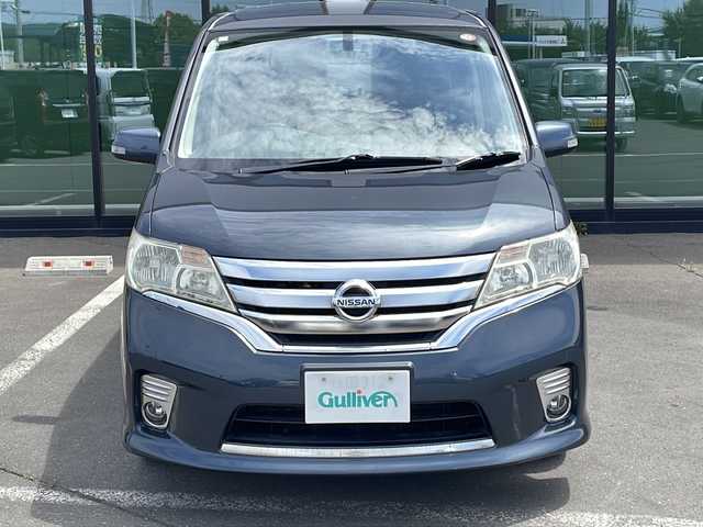 日産 セレナ ハイウェイスター 道東・釧路十勝 2010(平22)年 10.7万km スチールブルー ・４WD/・純正メモリナビ/（CD・DVD・AM・FM・フルセグ）/・バックカメラ/・純正フリップダウンモニター/・両側パワースライドドア/・社外アルミホイール/・スマートキー/・プッシュスタート/・アイドリングストップ/・クルーズコントロール/・社外フロアマット/・純正ドアバイザー/・ETC/・ステアリングスイッチ/・オートライト/・ダブルオートエアコン/・パワーステアリング/・パワーウィンドウ・/・横滑り防止/・電動格納ウィンカーミラー/・保証書/・取扱説明書/・記録簿