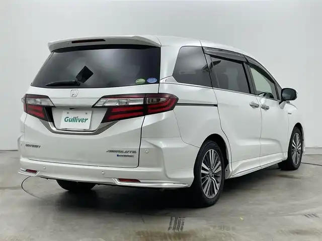 ホンダ オデッセイ ハイブリッド アブソルート・EXホンダセンジング 岡山県 2020(令2)年 8.1万km プラチナホワイトパール 純正９型ナビ(VXM-207VFNi)/【CD/DVD/BT/USB/Carplay/フルセグ/HDMI】/両側電動スライド　/全周囲カメラ　/レーダークルーズコントロール　/１００Ｖ電源　/ＥＴＣ2.0/シートヒーター　前席　/ＬＥＤヘッドライト　/ドライブレコーダー　前後　/ブラインドスポットモニター　/コーナーセンサー　前後/禁煙車/純正アルミ/アイドリングストップ/踏み間違い防止/ダブルエアコン