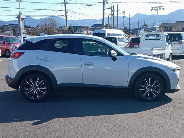 マツダ ＣＸ－３ XD ツーリング 福井県 2015(平27)年 5.5万km セラミックM 純正メモリナビ/AM/FM/フルセグ/BT/CD/DVD/USB/AUX/バックカメラ/BOSEサウンドシステム/クルーズコントロール/BSM/スマート・シティ・ブレーキ・サポート/横滑り防止装置/アイドリングストップ/盗難防止装置/ヘッドアップディスプレイ/ETC/パドルシフト/ハーフレザーシート/ダブル＋サイドエアバッグ/カーテンエアバッグ/純正18インチAW/LEDヘッドライト/スマートキー