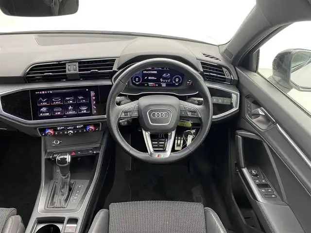 アウディ アウディ Ｑ３ SB 35TDIクワトロ Sライン 福井県 2022(令4)年 2.6万km グレイシアホワイトメタリック 純正ナビゲーション/Bluetooth接続/USB接続/全方位カメラ/アダプティブクルーズ/車線逸脱警報/衝突軽減ブレーキ/前後ドライブレコーダー/ビルトインETC/ハーフレザーシート/前席シートヒーター/バーチャルコックピット/コーナーセンサー/ダウンヒルアシスト/アイドリングストップ/LEDライト/横滑り防止装置/保証書/取扱説明書/整備手帳/スマートキーX1