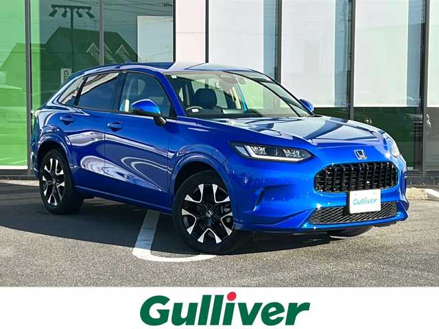 ホンダ ＺＲ－Ｖ ハイブリッド e:HEV Z 岐阜県 2023(令5)年 0.7万km プレミアムクリスタルブルークリスタル 登録時走行距離6127km/全方位カメラ/純正ディスプレイオーディオ/バックカメラ/フルセグＴＶ/ホンダセンシング/レザーシート/パワーシート/シートヒーター/ステアリングヒーター/ワイヤレス充電/パワーリアゲート/レーダークルーズコントロール/禁煙車/Bluetooth接続/ビルトインETC2.0/前後ドライブレコーダー/前後コーナーセンサー/レーンキープアシスト/ダウンヒルアシストコントロール/パドルシフト/プッシュスタート/スマートキー/スペアキー/LEDヘッドライト/オートライト/オートマチックハイビーム/アイドリングストップ
