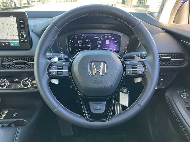 ホンダ ＺＲ－Ｖ ハイブリッド e:HEV Z 岐阜県 2023(令5)年 0.7万km プレミアムクリスタルブルークリスタル 登録時走行距離6127km/全方位カメラ/純正ディスプレイオーディオ/バックカメラ/フルセグＴＶ/ホンダセンシング/レザーシート/パワーシート/シートヒーター/ステアリングヒーター/ワイヤレス充電/パワーリアゲート/レーダークルーズコントロール/禁煙車/Bluetooth接続/ビルトインETC2.0/前後ドライブレコーダー/前後コーナーセンサー/レーンキープアシスト/ダウンヒルアシストコントロール/パドルシフト/プッシュスタート/スマートキー/スペアキー/LEDヘッドライト/オートライト/オートマチックハイビーム/アイドリングストップ