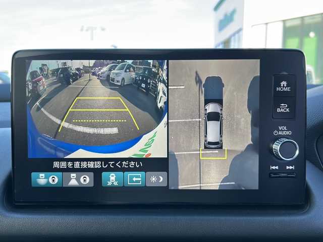 ホンダ ＺＲ－Ｖ ハイブリッド e:HEV Z 岐阜県 2023(令5)年 0.7万km プレミアムクリスタルブルークリスタル 登録時走行距離6127km/全方位カメラ/純正ディスプレイオーディオ/バックカメラ/フルセグＴＶ/ホンダセンシング/レザーシート/パワーシート/シートヒーター/ステアリングヒーター/ワイヤレス充電/パワーリアゲート/レーダークルーズコントロール/禁煙車/Bluetooth接続/ビルトインETC2.0/前後ドライブレコーダー/前後コーナーセンサー/レーンキープアシスト/ダウンヒルアシストコントロール/パドルシフト/プッシュスタート/スマートキー/スペアキー/LEDヘッドライト/オートライト/オートマチックハイビーム/アイドリングストップ