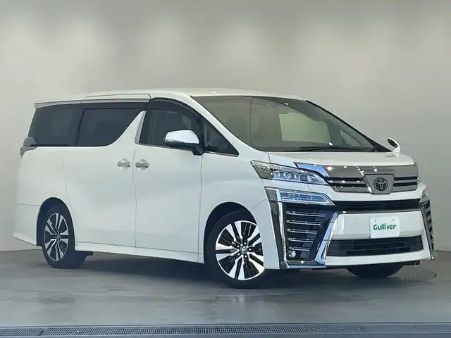 トヨタ ヴェルファイア Z Gエディション 栃木県 2020(令2)年 1.9万km ホワイトパールクリスタルシャイン 純正ナビ/(フルセグTV・Bluetooth・CD・DVD・USB)/純正後席モニター/バックカメラ/トヨタセーフティセンス/ ・プリクラッシュセーフティ/ ・レーンキープアシスト/ ・オートクルーズコントロール/ ・オートハイビーム/前後コーナーセンサー/両側パワースライドドア/電動リアゲート/前席パワーシート/2列目席電動リクライニング・オットマン/前席シートヒーター・エアシート/合皮シート/ステアリングヒーター/ブレーキホールド/LEDヘッドライト/オートライト/シーケンシャルウィンカー/ETC/AC100V充電/スマートキー/スペアキー/取扱説明書/保証書