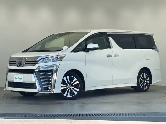 トヨタ ヴェルファイア Z Gエディション 栃木県 2020(令2)年 1.9万km ホワイトパールクリスタルシャイン 純正ナビ/(フルセグTV・Bluetooth・CD・DVD・USB)/純正後席モニター/バックカメラ/トヨタセーフティセンス/ ・プリクラッシュセーフティ/ ・レーンキープアシスト/ ・オートクルーズコントロール/ ・オートハイビーム/前後コーナーセンサー/両側パワースライドドア/電動リアゲート/前席パワーシート/2列目席電動リクライニング・オットマン/前席シートヒーター・エアシート/合皮シート/ステアリングヒーター/ブレーキホールド/LEDヘッドライト/オートライト/シーケンシャルウィンカー/ETC/AC100V充電/スマートキー/スペアキー/取扱説明書/保証書