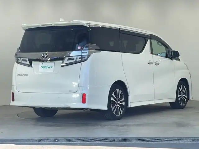 トヨタ ヴェルファイア Z Gエディション 栃木県 2020(令2)年 1.9万km ホワイトパールクリスタルシャイン 純正ナビ/(フルセグTV・Bluetooth・CD・DVD・USB)/純正後席モニター/バックカメラ/トヨタセーフティセンス/ ・プリクラッシュセーフティ/ ・レーンキープアシスト/ ・オートクルーズコントロール/ ・オートハイビーム/前後コーナーセンサー/両側パワースライドドア/電動リアゲート/前席パワーシート/2列目席電動リクライニング・オットマン/前席シートヒーター・エアシート/合皮シート/ステアリングヒーター/ブレーキホールド/LEDヘッドライト/オートライト/シーケンシャルウィンカー/ETC/AC100V充電/スマートキー/スペアキー/取扱説明書/保証書
