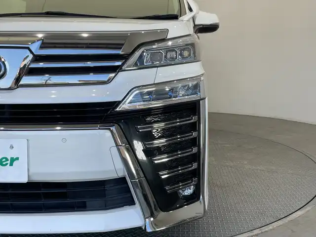 トヨタ ヴェルファイア Z Gエディション 栃木県 2020(令2)年 1.9万km ホワイトパールクリスタルシャイン 純正ナビ/(フルセグTV・Bluetooth・CD・DVD・USB)/純正後席モニター/バックカメラ/トヨタセーフティセンス/ ・プリクラッシュセーフティ/ ・レーンキープアシスト/ ・オートクルーズコントロール/ ・オートハイビーム/前後コーナーセンサー/両側パワースライドドア/電動リアゲート/前席パワーシート/2列目席電動リクライニング・オットマン/前席シートヒーター・エアシート/合皮シート/ステアリングヒーター/ブレーキホールド/LEDヘッドライト/オートライト/シーケンシャルウィンカー/ETC/AC100V充電/スマートキー/スペアキー/取扱説明書/保証書