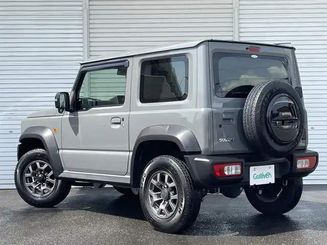 スズキ ジムニー シエラ JC 福島県 2023(令5)年 4.5万km ミディアムグレー ワンオーナー/パートタイム4WD/デュアルセンサーブレーキサポート/ダウンヒルアシストコントロール/クルーズコントロール/アイドリングストップ/シートヒーター/純正ドアバイザー/純正フロアマット/プッシュスタート/オートライト/LEDヘッドライト/フォグライト
